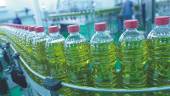 PRODUCTO. Aceite de oliva envasado preparado para su venta en los mercados.