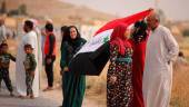 OFENSIVA. Mujeres con la bandera Siria en una protesta contra la ocupación turca.