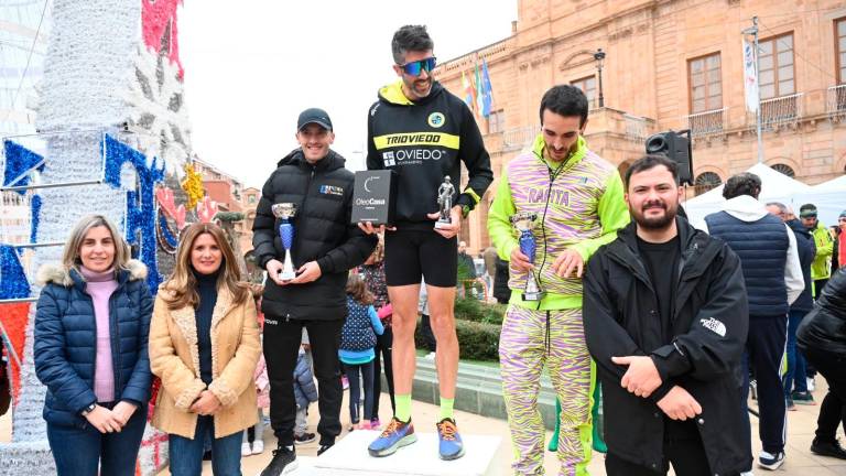 Juan Bautista y Lola Chiclana repiten victoria en la San Silvestre de Linares Juan Bautista y Lola Chiclana repiten victoria en la San Silvestre de Linares