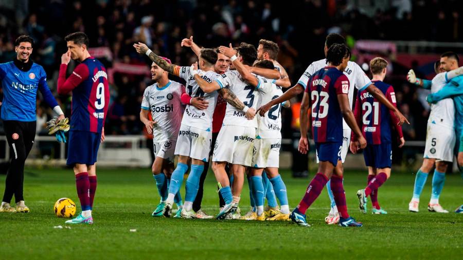 <i>Los jugadores del Girona celebran la victoria ante el Barça el domingo. / AFP7 / Europa Press.</i> <i>Los jugadores del Girona celebran la victoria ante el Barça el domingo. / AFP7 / Europa Press.</i>