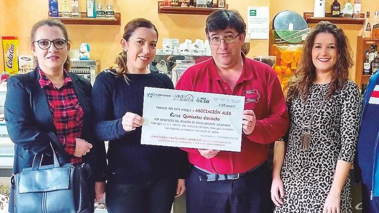 Entrega del dinero recaudado para ALES Entrega del dinero recaudado para ALES