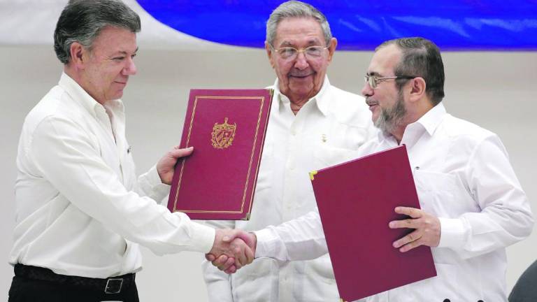 Acuerdo en Colombia para el abandono de las armas Acuerdo en Colombia para el abandono de las armas