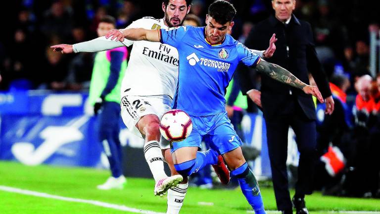 Un gris Real Madrid entorpece las pretensiones del Getafe Un gris Real Madrid entorpece las pretensiones del Getafe