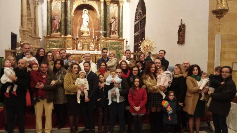 Bautizados ante la Virgen en Lopera Bautizados ante la Virgen en Lopera