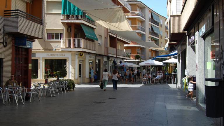 Una calle a través de sus negocios Una calle a través de sus negocios