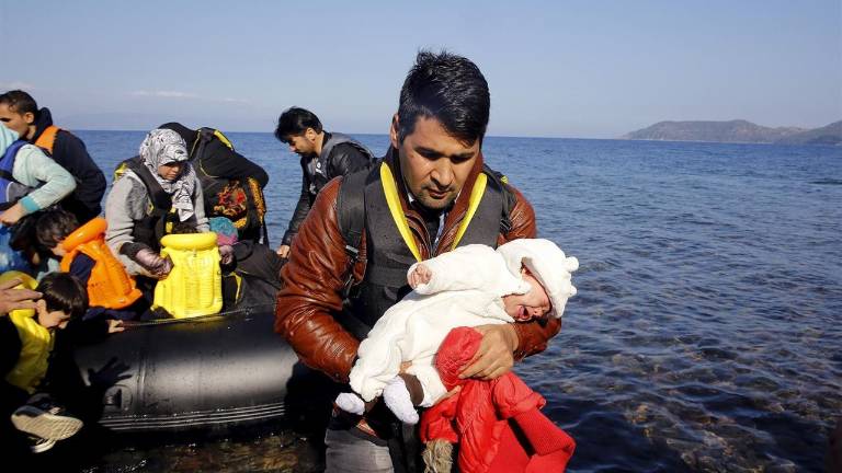Merkel promete una bajada notable del flujo de refugiados Merkel promete una bajada notable del flujo de refugiados