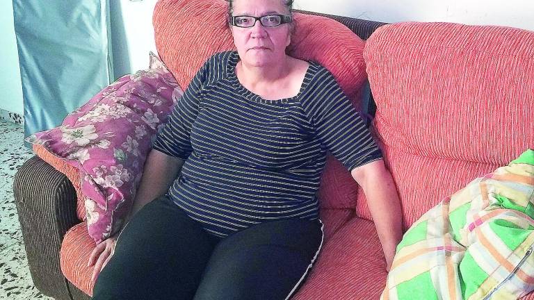 Una mujer exige su derecho a contar con una vivienda digna Una mujer exige su derecho a contar con una vivienda digna