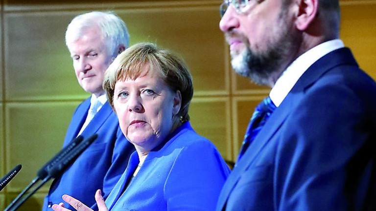 Acuerdo de Merkel y Schulz para reeditar la gran coalición en Alemania