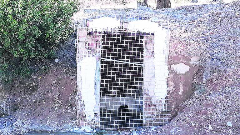 Protección para un pozo que carecía de puerta Protección para un pozo que carecía de puerta