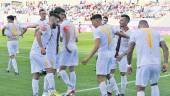 Jugadores del Real Jaén celebran un gol ante la UD Torre del Mar en La Victoria.