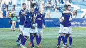 dos momentos. Los jugadores del Linares Deportivo y del Almería B celebran los goles conseguidos.