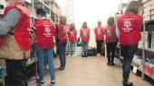 SOLIDARIDAD. Voluntarios de Cáritas Úbeda trabajando en la casa de la Iglesia.