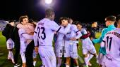 Los jugadores del Real Jaén después de remontar el partido frente al Recreativo de Huelva en el último minuto con el tanto de Sako. / Juande Ortiz.