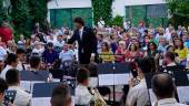 reconocimiento. Actuación de la Agrupación Musical Linares 1875, en el patio de caballos del coso.