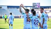 Adri Paz celebra su gol frente al Málaga City junto a Pablo de Castro, Óscar Lozano y Juan Cámara. / Miranda López/ Real Jaén. 