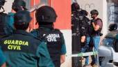 Guardias civiles en el portal de viviendas donde está el atrincherado. / Europa Press.