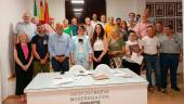 La ejecutiva del partido, junto a otros militantes.