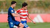 Sergio Gutiérrez y Miguel Ángel Sánchez en una acción del partido. / Recreativo Granada.