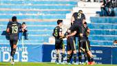 Jugadores del Real Madrid Castilla celebran un gol en Linarejos / Linares Deportivo.