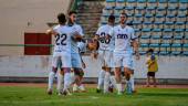 Óscar Lozano, Antonio Caballero y Agus Alonso se felicitan después de conseguir un gol. / Miranda López / Real Jaén.