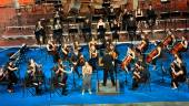 La Orquesta Joven de Jaén en la clausura del festival BaezaFest en un concierto que congregó a más de 150 asistentes para disfrutar de una noche llena de música clásica. / J. G. Armijo / DIairo JAÉN. 
