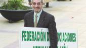MEMORIA. José Bautista Soriano, con el cartel de la Federación de Asociaciones Vecinales OCO.