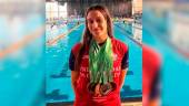 Paula Agudo posa con sus siete medallas al cuello. 