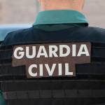 Un agente de la Guardia Civil de espaldas. Archivo.