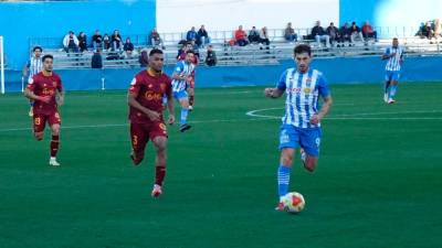 Manny y Chris Martínez, en una jugada del partido / La Opinión de Murcia.