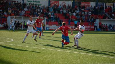 Migue García y Mario Martos realizan una acción de ataque del Real Jaén en la eliminatoria de la pasada temporada. / Mario Pastor. 