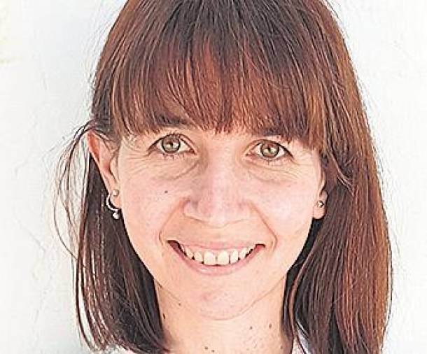<i>María Guzman, maestra. </i>