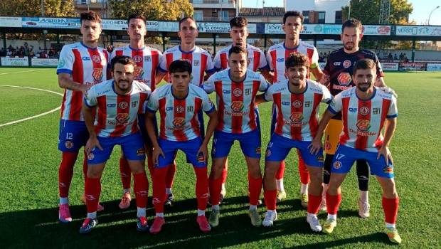 <i>Formación de la UDC Torredonjimeno contra el Arenas.</i>