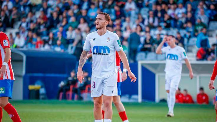 <i>Agus Alonso y Ñito González, en partidos de la pasada temporada. / Real Jaén.</i>