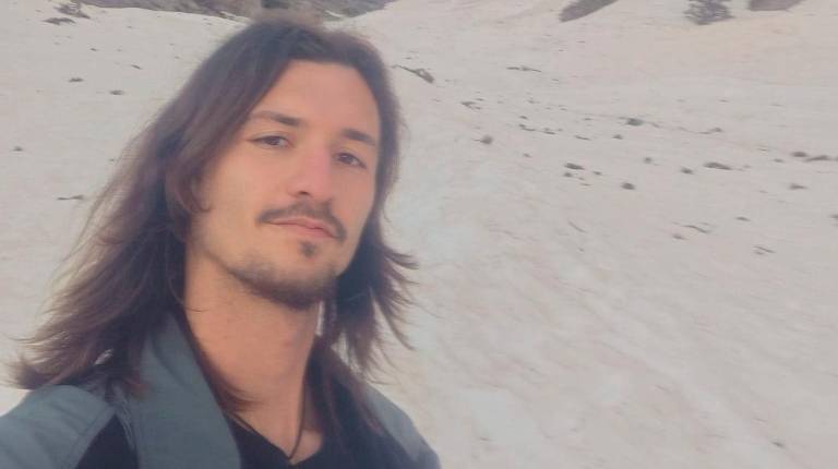 <i>El joven de Andújar Francisco de Paula Expósito en una fotografía enviada a su familia desde el Monte Olimpo.</i>