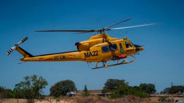 <i>Un helicóptero del Infoca. Archivo. / María José López / Europa Press.</i>