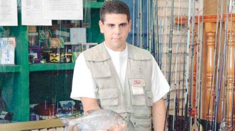 <i>Un pescador de Úbeda ha capturado un ejemplar de piraña de casi un kilo de peso en el pantano. / Archivo histórico Diario JAÉN. </i>