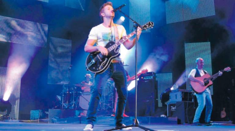 <i>Pablo Alborán durante el concierto. / Archivo histórico Diario JAÉN. </i>