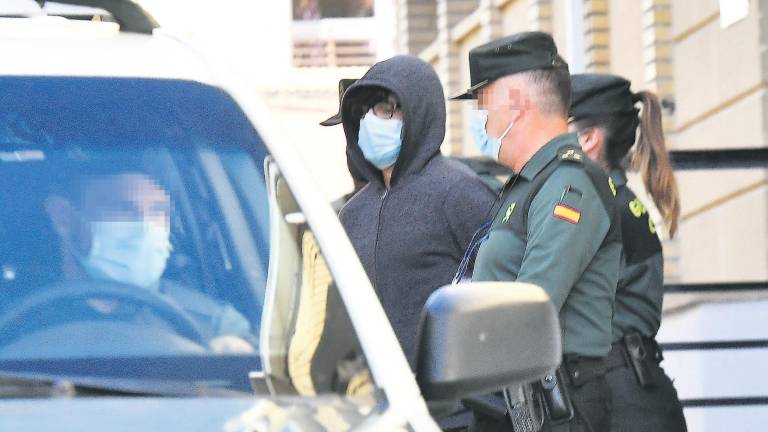 18 DE FEBRERO. Nazarín (Nazzaryn) N. N. es conducido hasta un coche de la Guardia Civil, junto al juzgado.