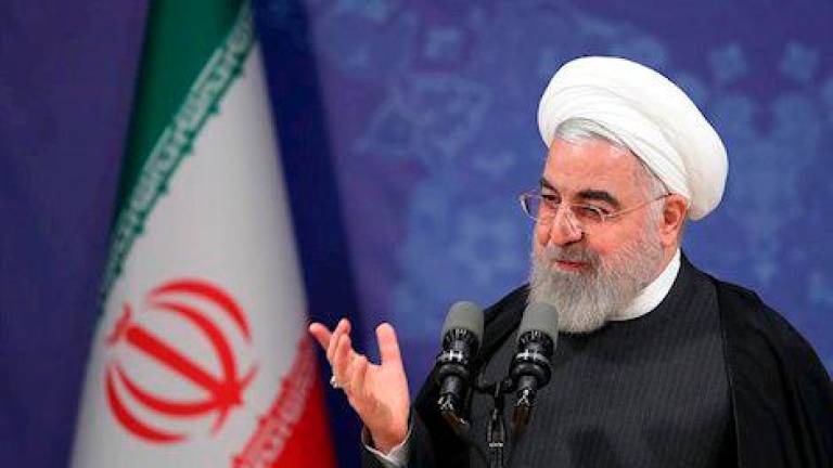 Rohani insta a los iraníes a “no huir de las urnas” y participar