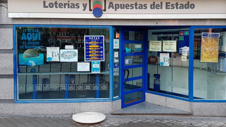 <i>Un despacho de Loterías y Apuestas del Estado. / Europa Press. </i>