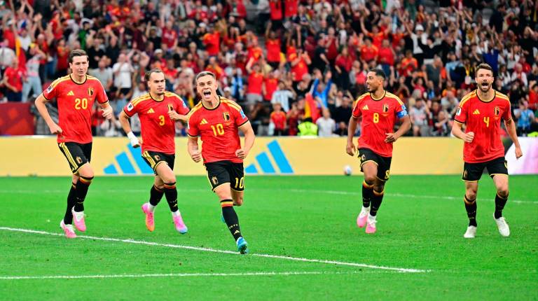 <i>Los jugadores de Bélgica celebran uno de los goles frente a Nueva Zelanda. / Dirk Waem / Belga / dpa.</i>