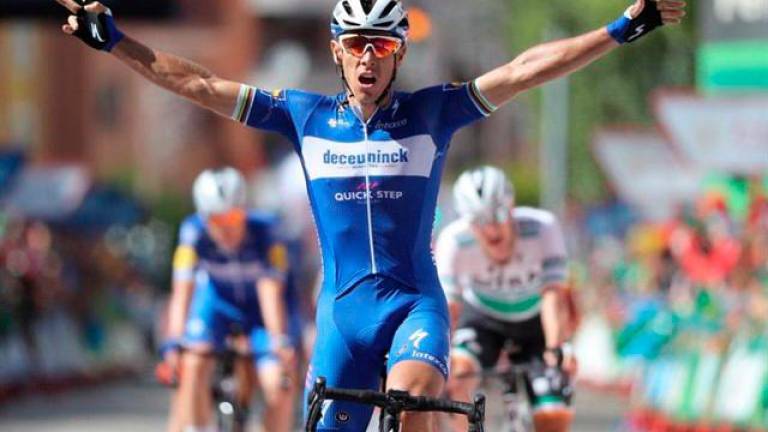 Gilbert gana y Quintana agita el podio en La Vuelta