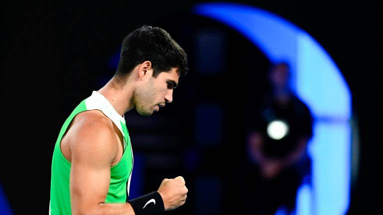 Alcaraz completa su colección con el Abierto de Australia