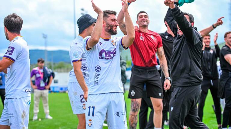 <i>Los jugadores del Real Jaén celebran la clasificación. / Miranda López / Real Jaén.</i>