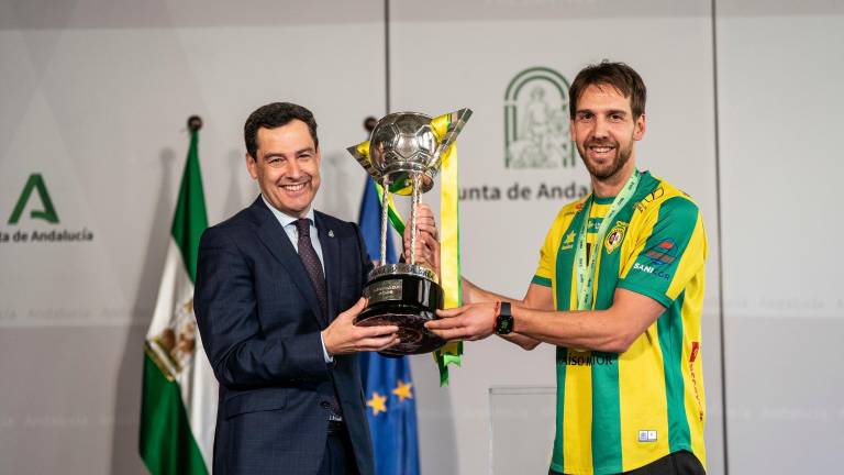 Momentos de un recibimiento para celebrar un título, orgullo de Andalucía