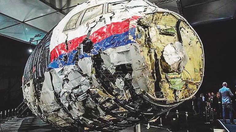 Tres rusos y un ucraniano, acusados de derribar un avión