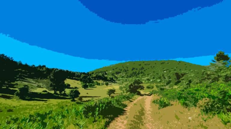 <i>Camino a Pozo Romero, al fondo, en la primavera de 2025| FrotSE.</i>