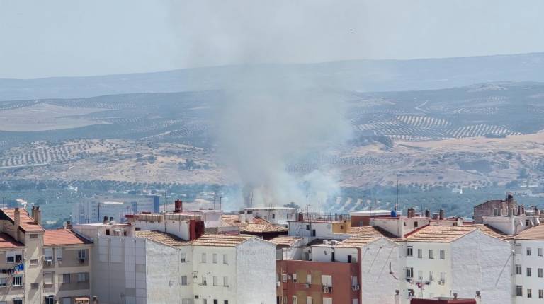 <i>Vista de la columna de humo desde un edificio de la capital. </i>