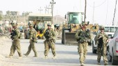 EJÉRCITO. Miembros de las fuerzas armadas norteamericanas patrullan en Irak.