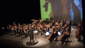 CONCIERTO. El director musical Juan Paulo Gómez, junto con la Partiture Philharmonic Orchestra en una imagen de archivo.
